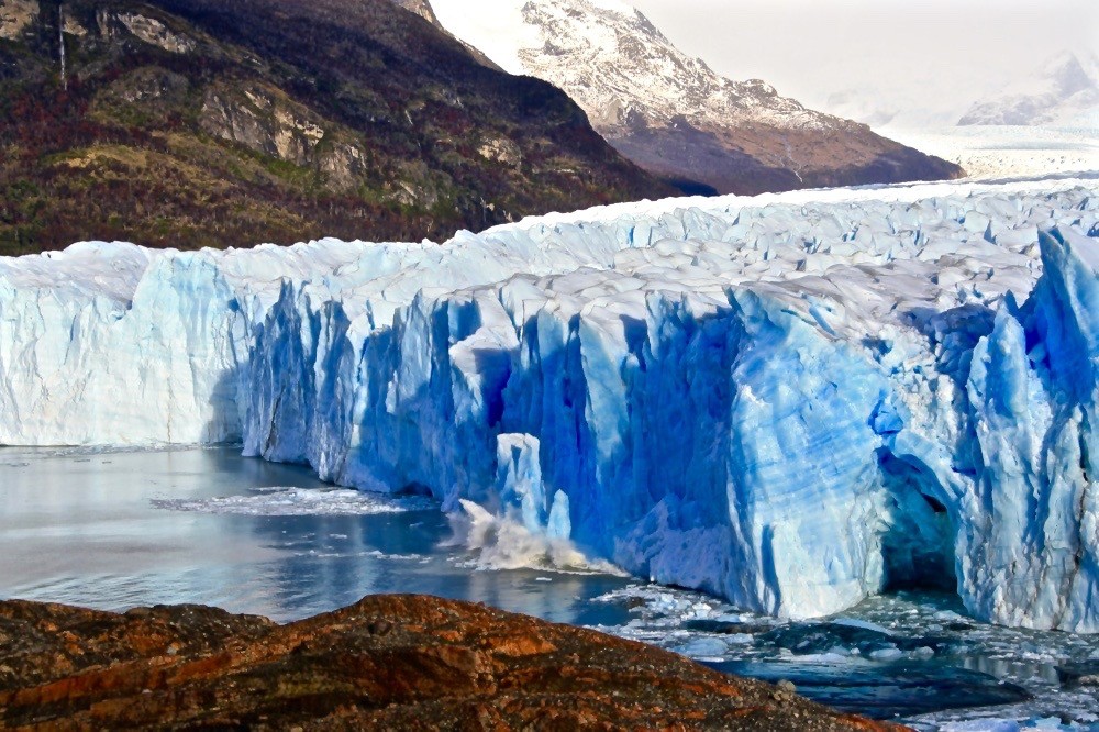 A slab of ice calves from the face of Perito Moreno Glacier 