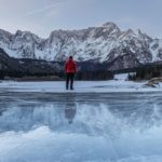 man on frozen lake essentials for safe travel