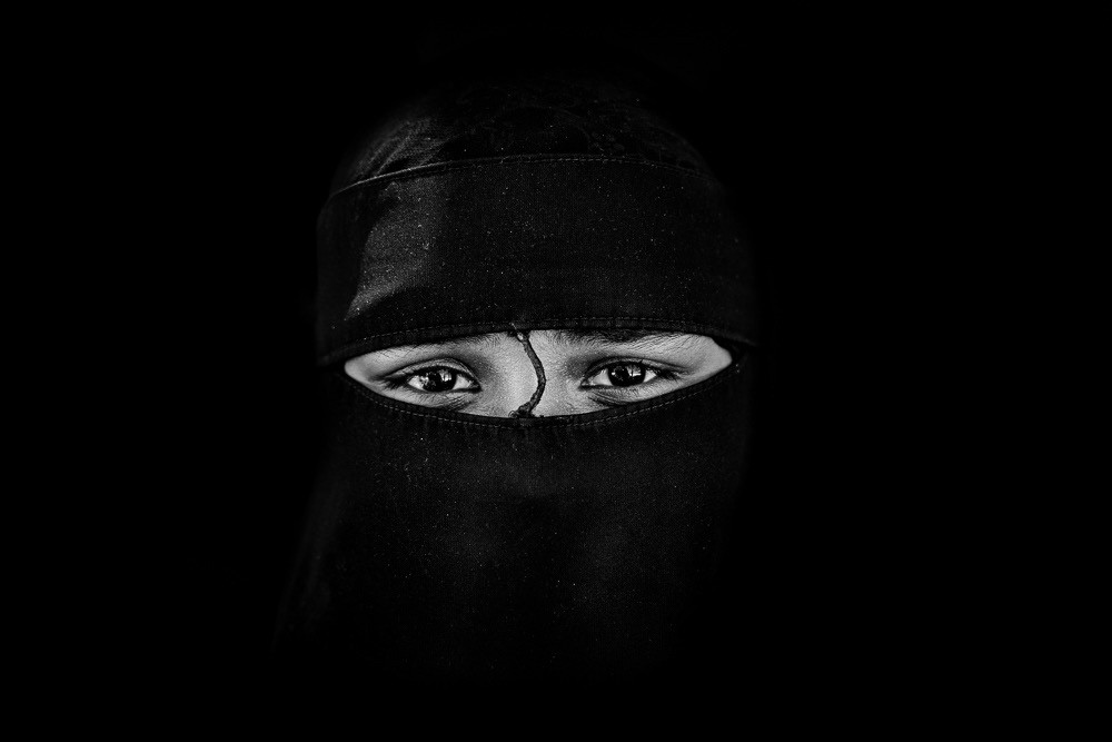 Muslim woman, photographing local women