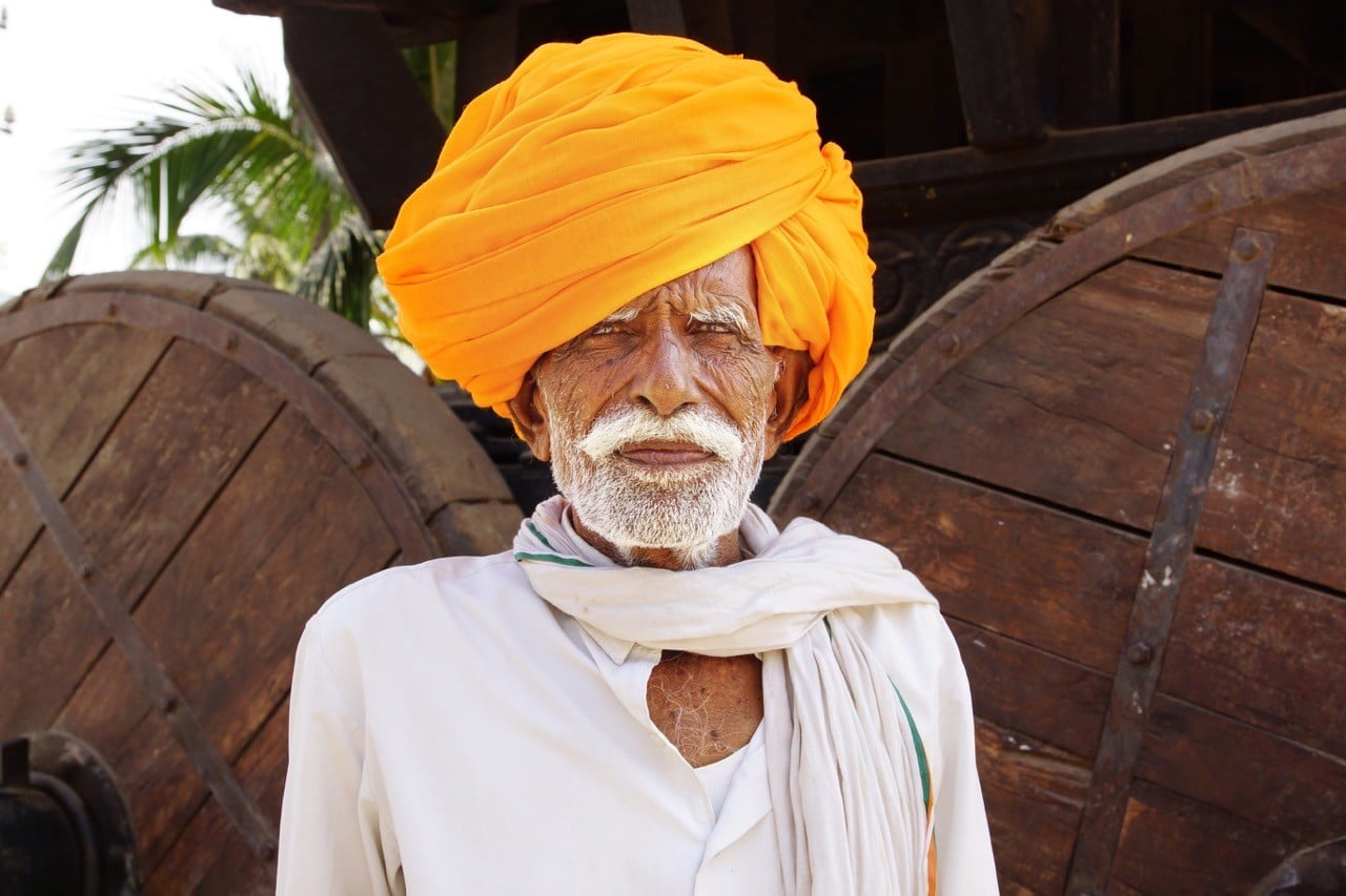 travel skills: old Indian man in yellow turban