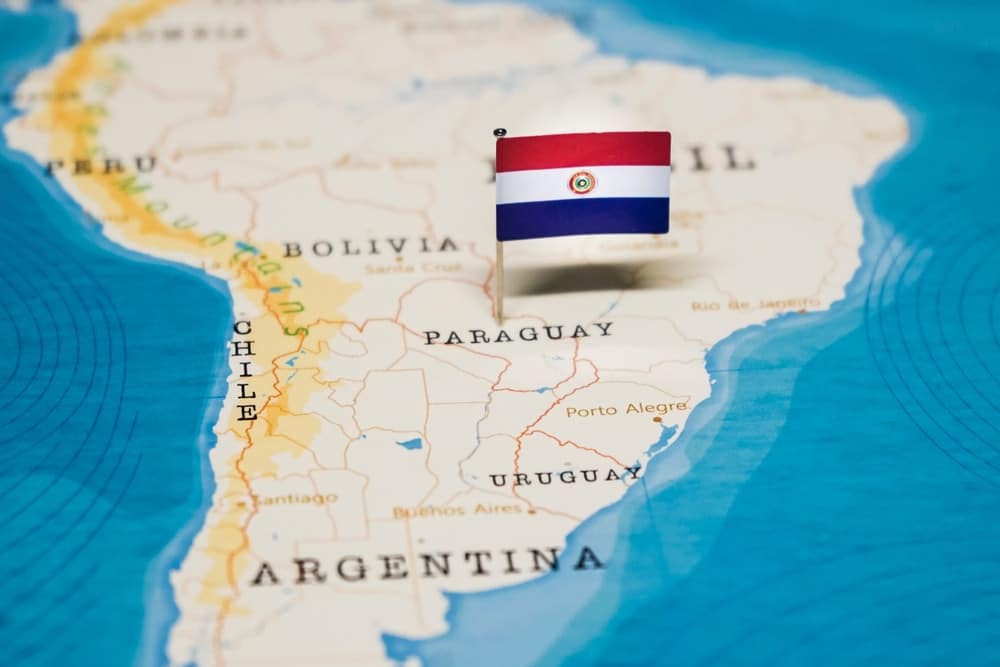 A map of Paraguay with a flag showing its location in South America
