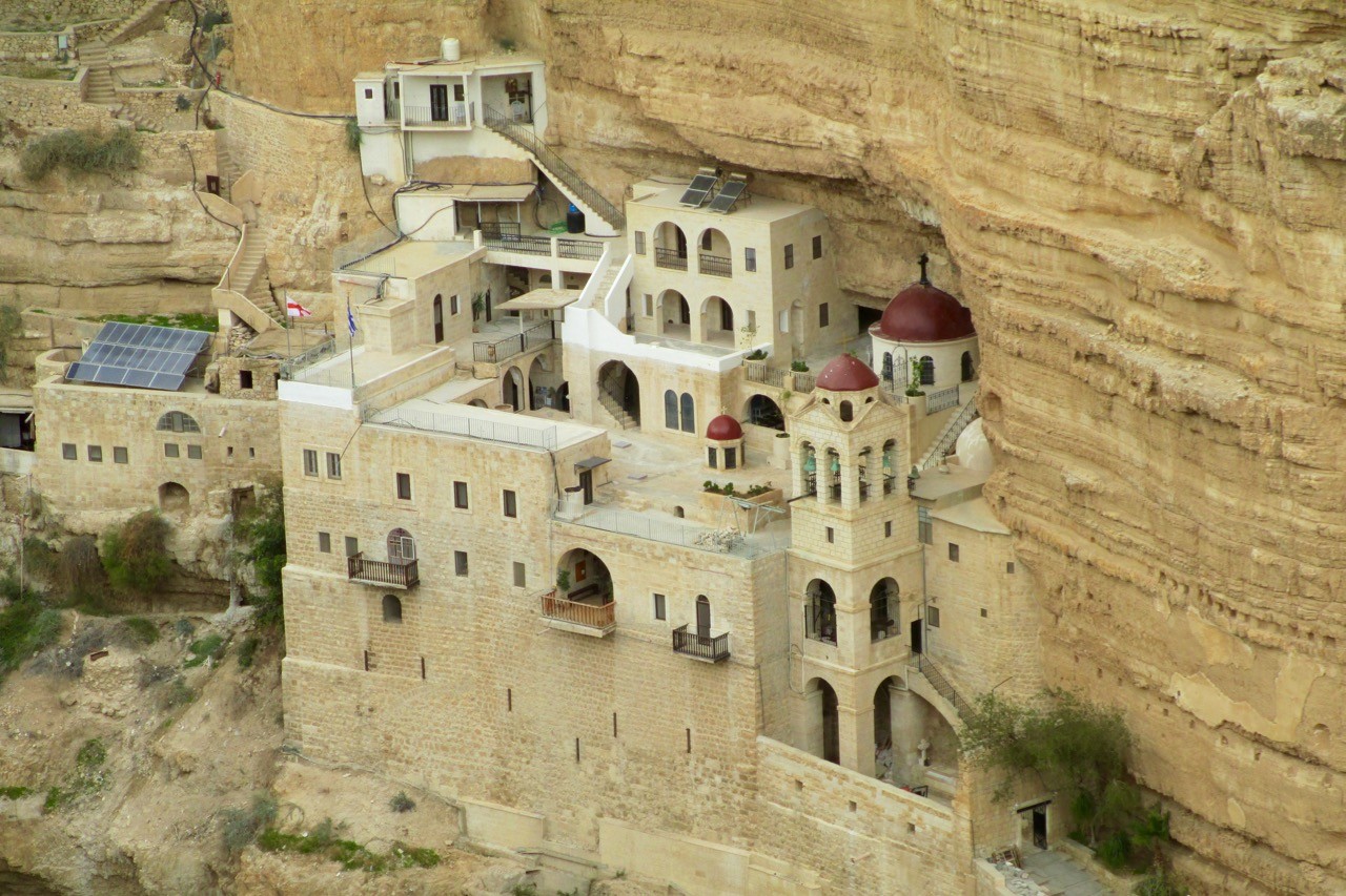 https://www.atlasandboots.com/wp-content/uploads/2016/01/oldest-cities-in-the-world-St._George_Monastery_in_Wadi_Qelt.jpg