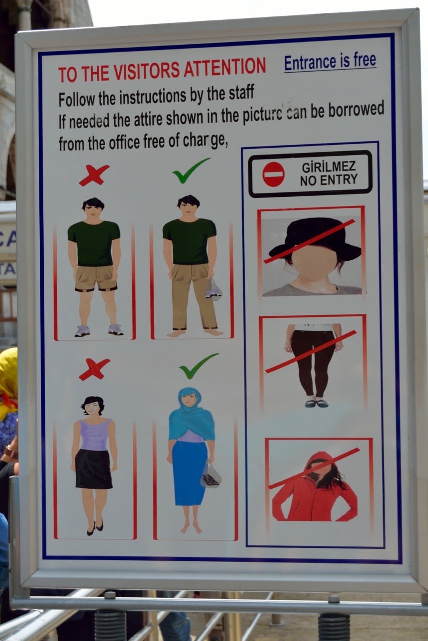 A sign explaining the correct Blue Mosque dress code