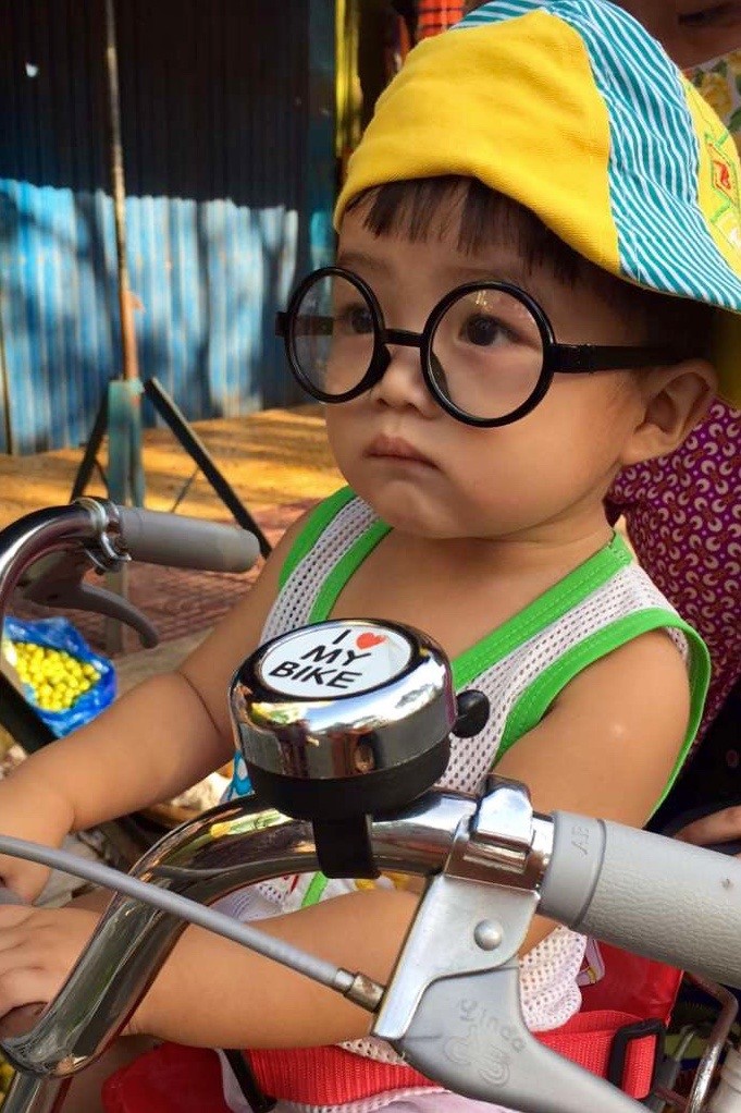 Hipster kid, Mekong river cruise