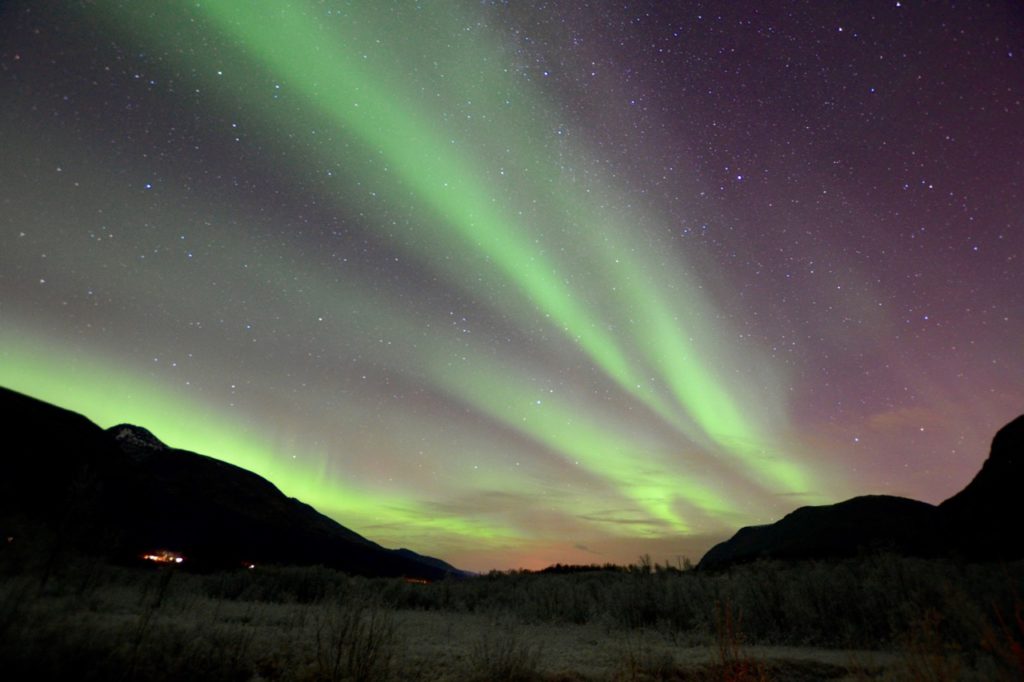 a photo taken while chasing the northern lights in tromso