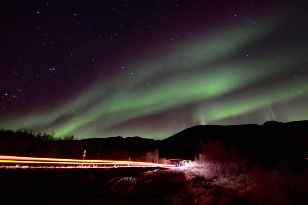 a photo taken while chasing the northern lights in tromso