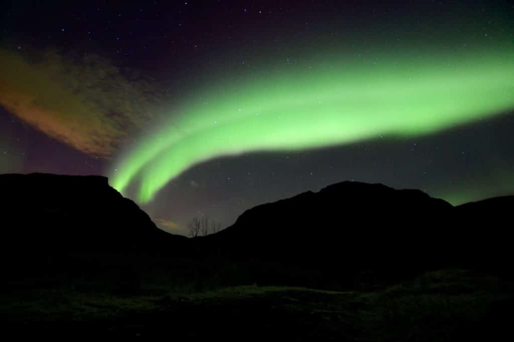 a photo taken while chasing the northern lights in tromso