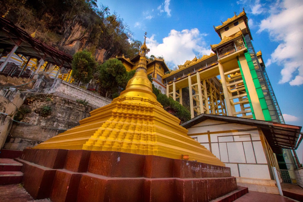 a pagoda at the entrance of the Pindaya Caves