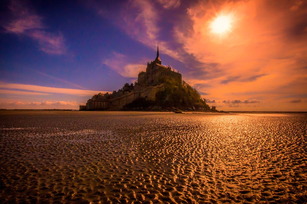 Mont Saint-Michel at sunset from the mudflats 