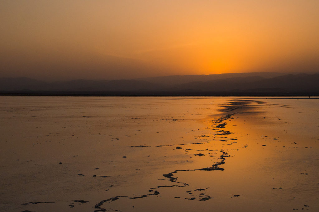 Sunset over the salt flats of Lake Asale