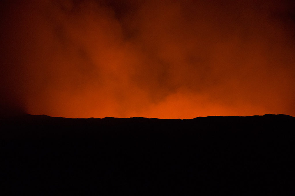 A devilish glow rises above the rim of Erta Ale