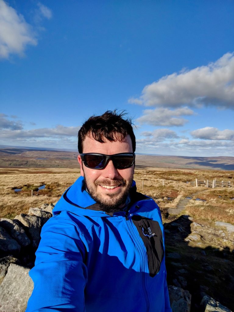 Peter summitting a Dales 30 move to the country