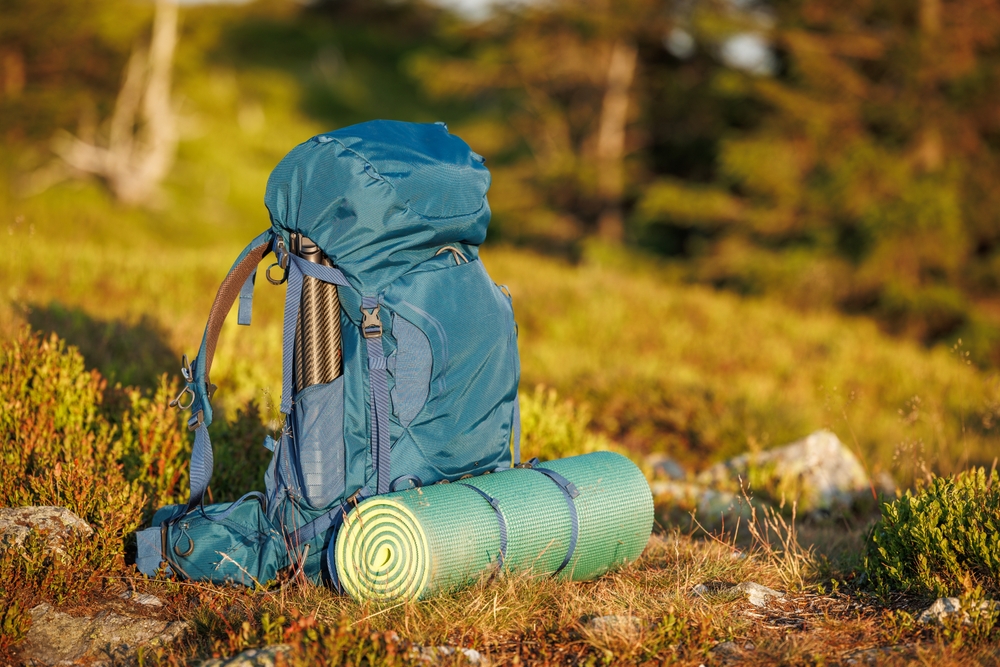 A backpack with a sleeping mat