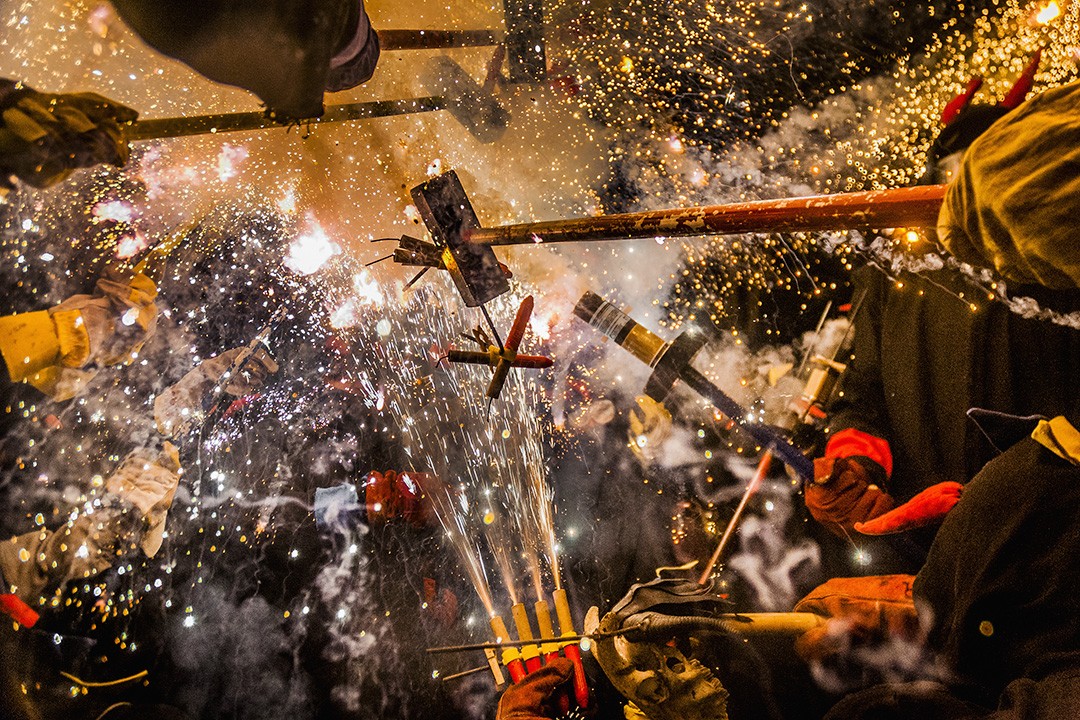 Fireworks during the traditional Catalan celebration is known as correfoc