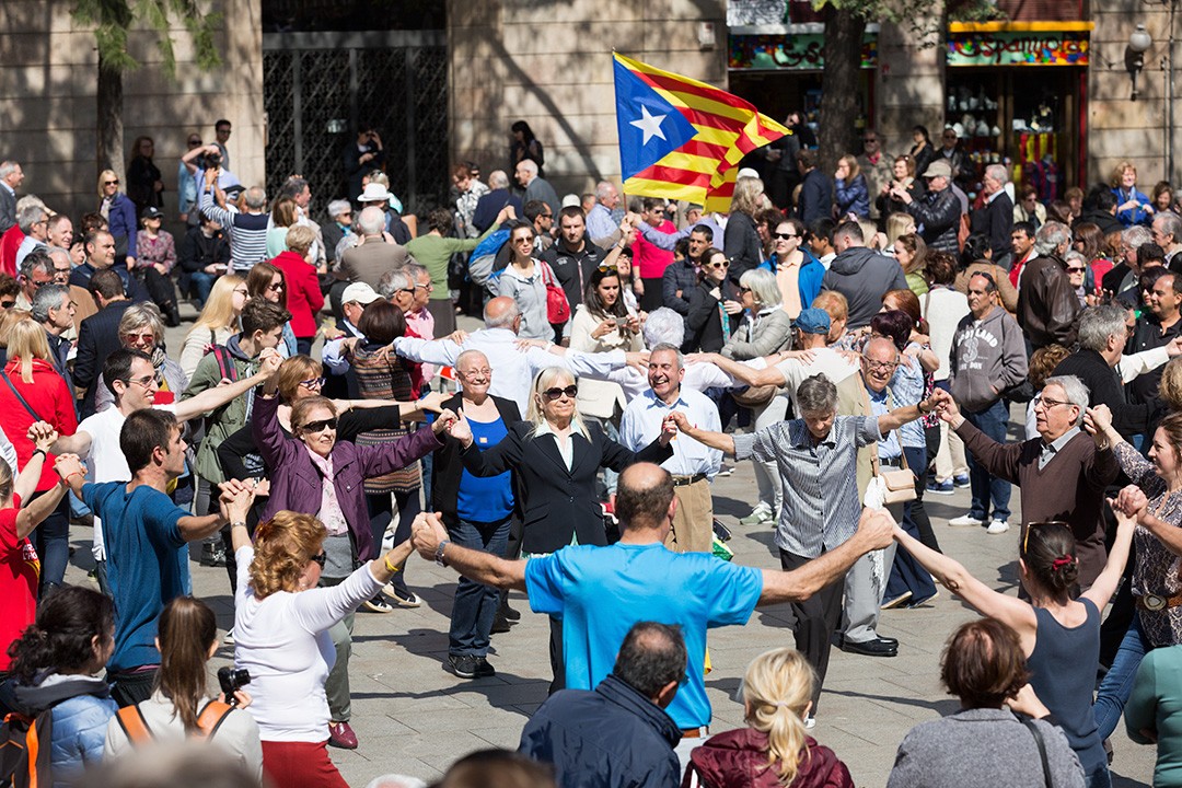 People performing the Sardana dance in a public square