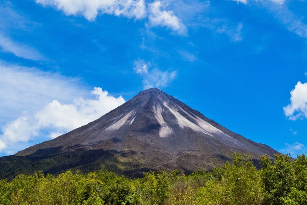 Arenal volcano with a small stream of smoke