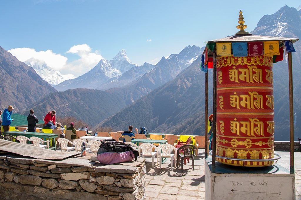 Drinking tea with views of Ama Dablam along the  Everest base camp trek