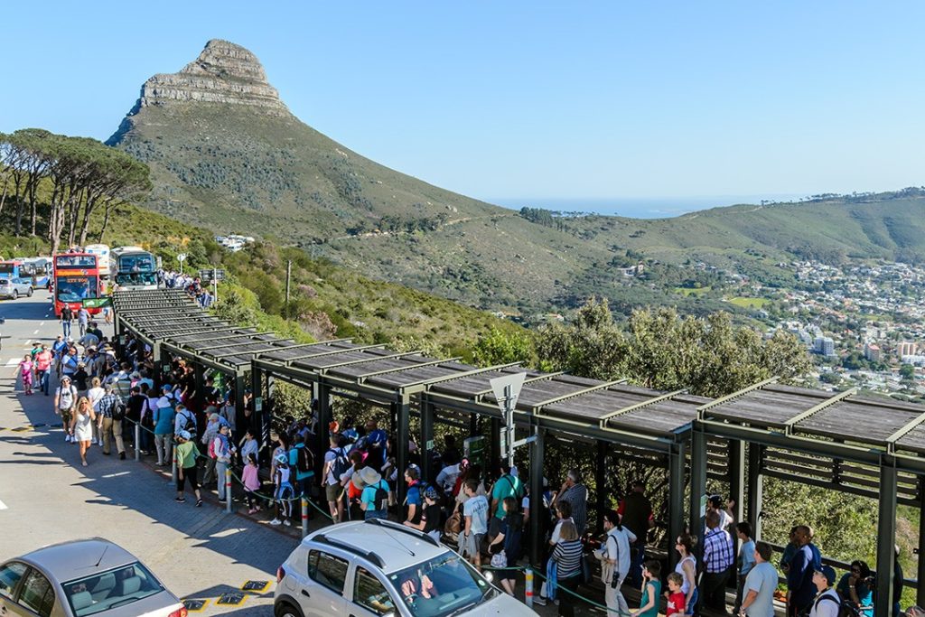 crowds wait for the cable car at table mountain