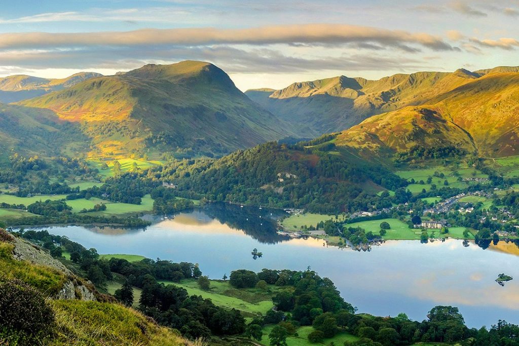 Dawn light over Ullswater and the Helvellyn range is a great outdoor destination in Britain