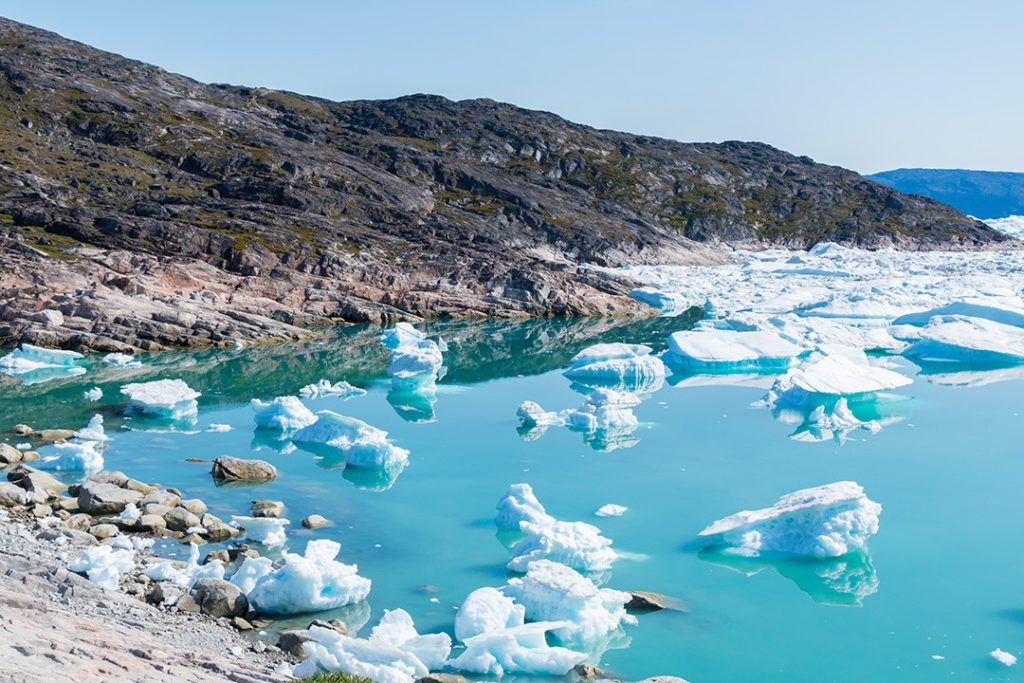 Hiking around Ilulissat icebergs in the bay
