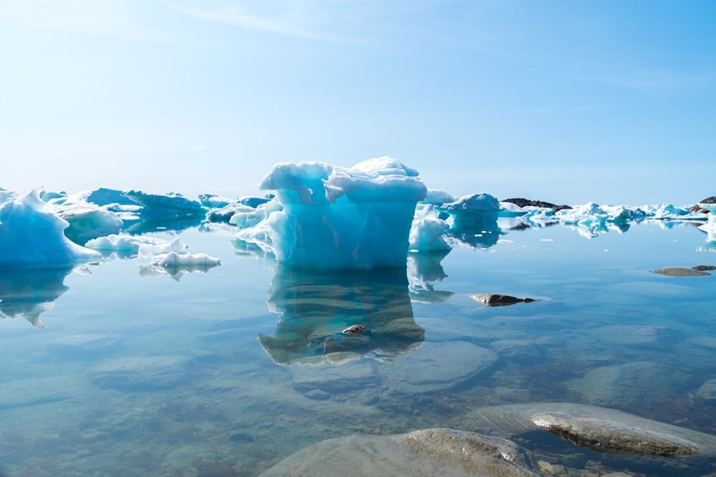 Hiking around Ilulissat icebergs in the bay