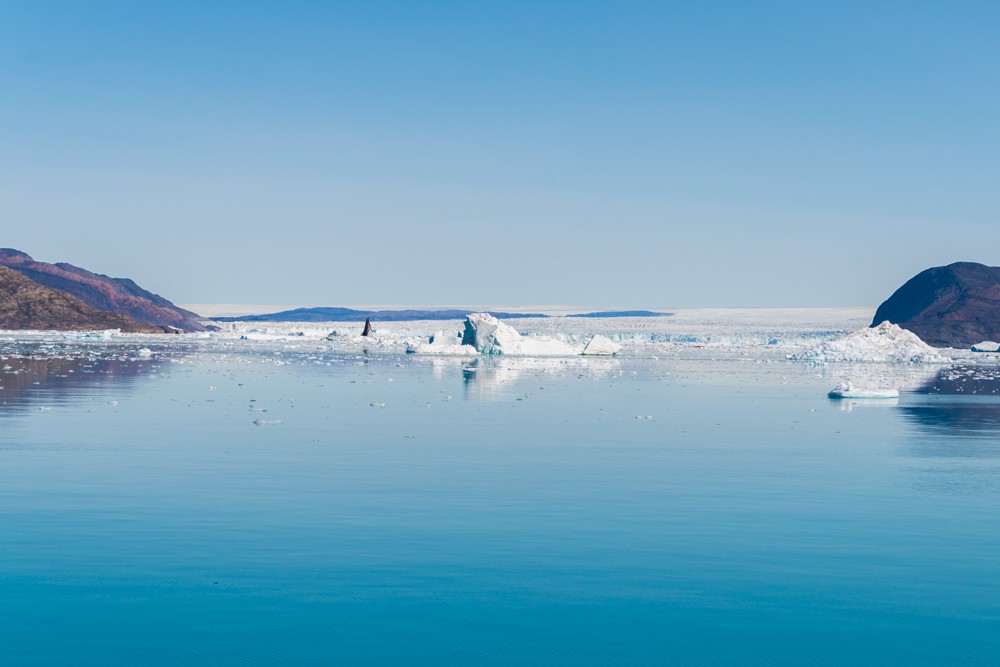 Eqi Glacier first appears on the horizon