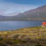 trekking the arctic circle trail lead image with hut and lake