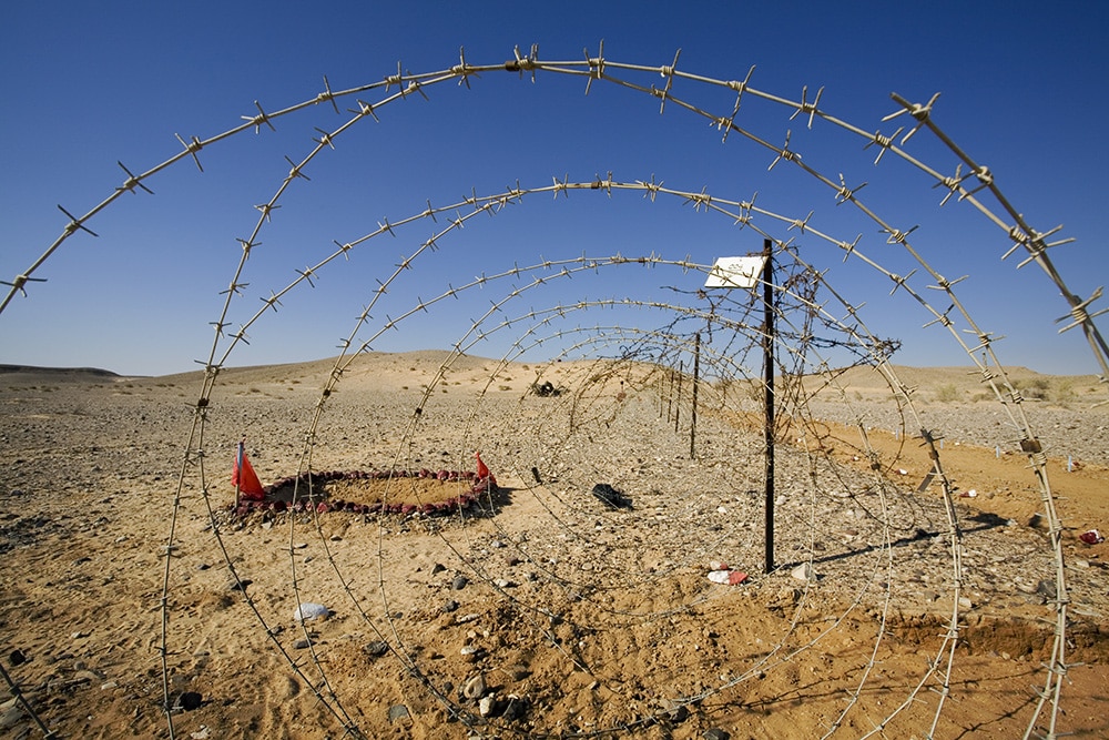 most dangerous countries in the world lead image with barbed wire