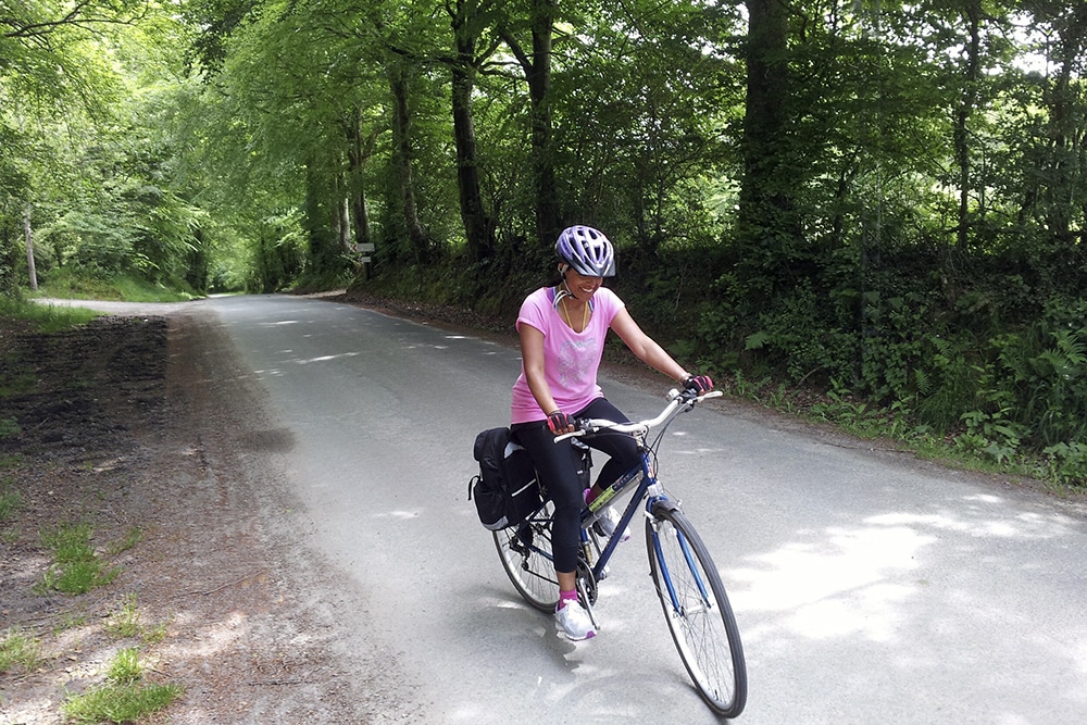 Author Jini Reddy rides a bike
