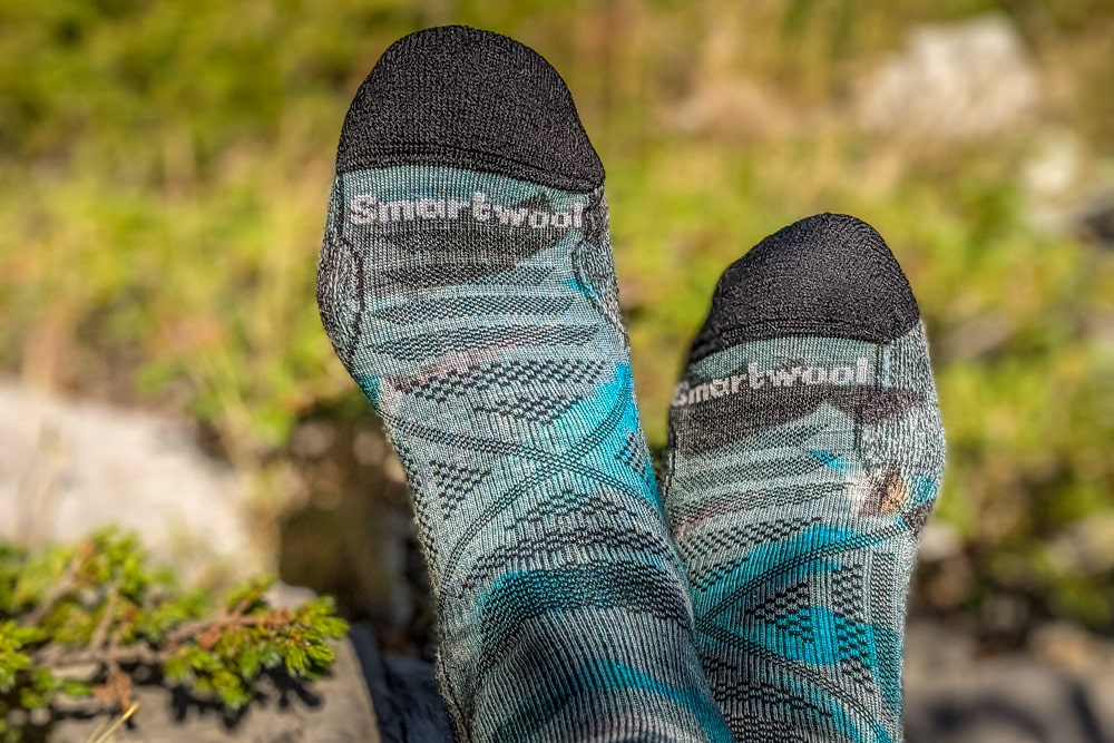 A pair of wool socks help prevent blisters