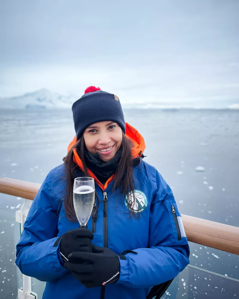 A celebratory drink as we cross the Antarctic Circle – one of the reasons to visit Antarctica