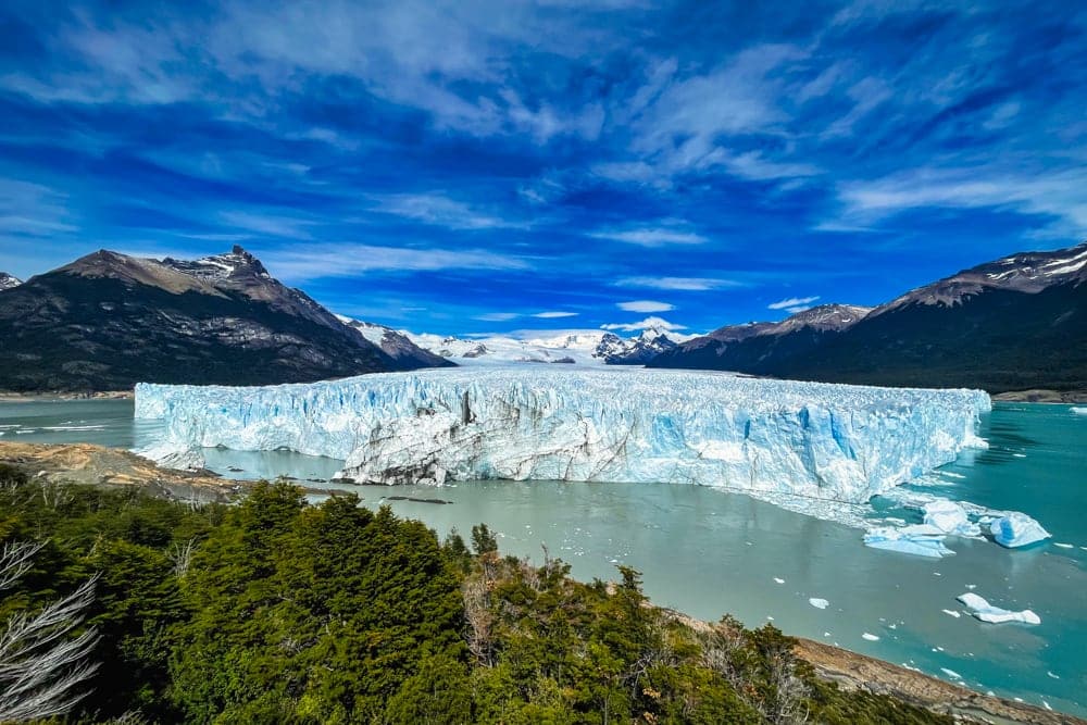 A wide shot of Perito Moreno Glacier and the surrounding mountains