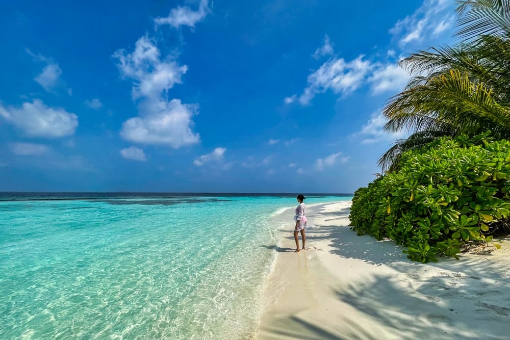 Kia on a beach in Baros Maldives