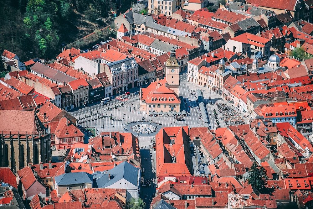 Aerial view of Brasov in Romania – one of the countries offering remote work visas