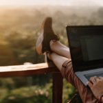 woman using laptop in one of the countries offering remote work visas