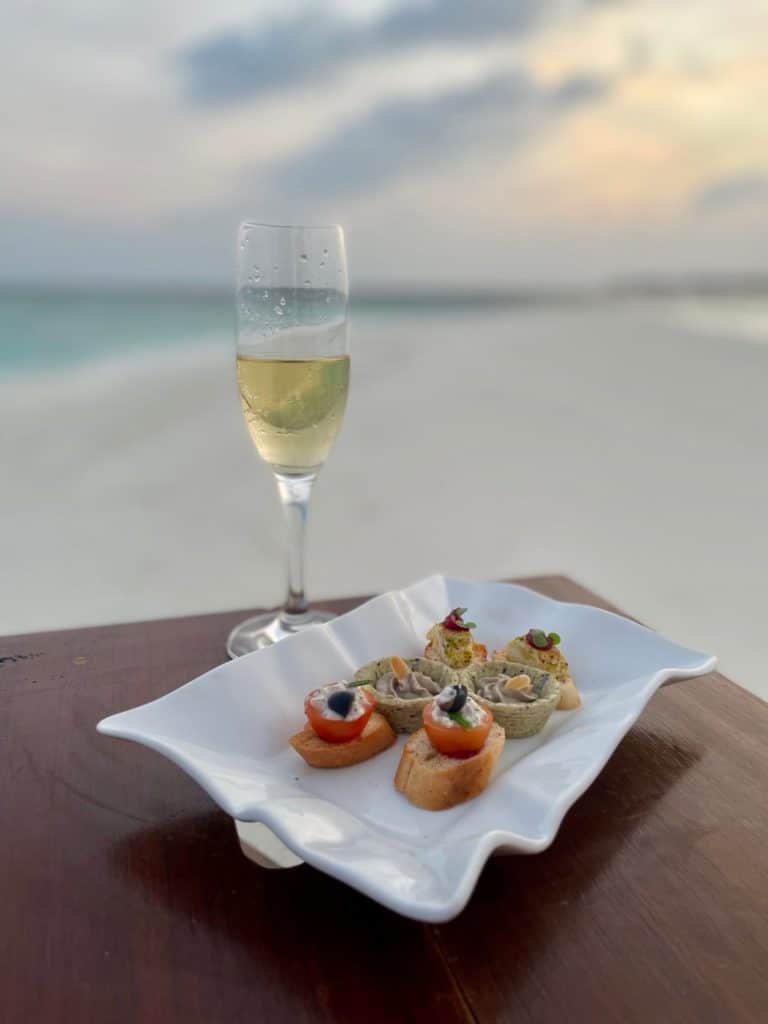 Champagne and canapés at at Baros Maldives