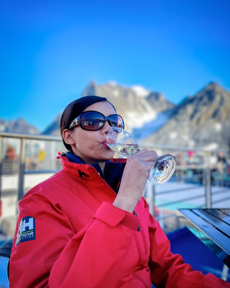 Kia drinking champaign  – one of the reasons to visit Svalbard