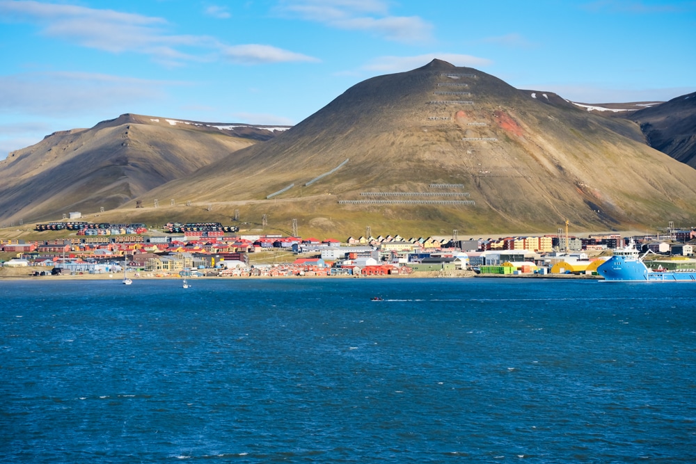 Longyearbyen seen from the sea on a sunny day