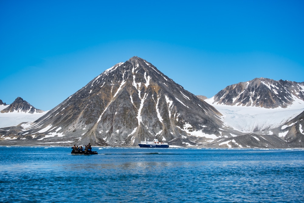 A zodiac in Magdalenefjord – one of the reasons to visit Svalbard