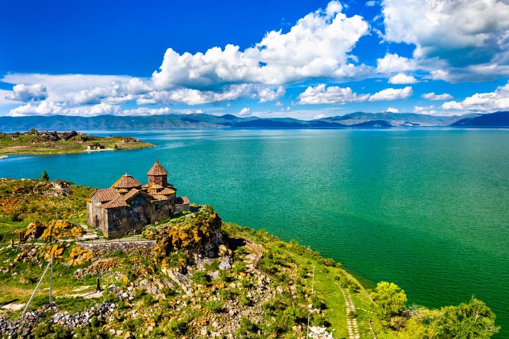 A monastery overlooking Lake Sevan – one of the best day trips from Yerevan