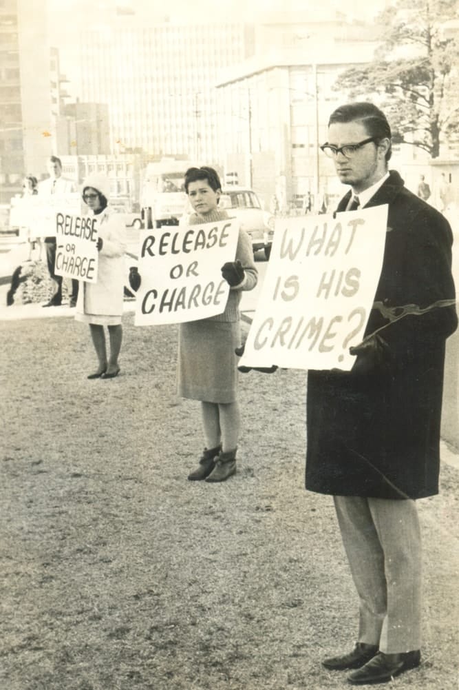 Studentsin apartheid South Africa holding placards