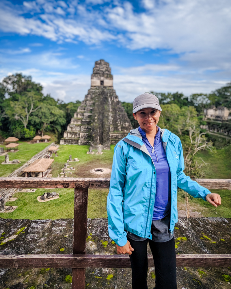 Kia at Tikal in a raincoat