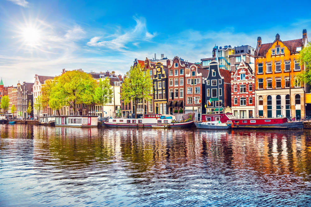 A canal scene in Amsterdam – one of the best cities to visit in Europe 