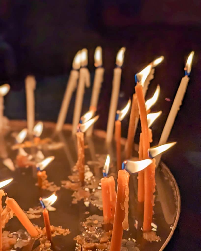 Candles inside the Church of the Holy Sepulchre in Jerusalem's Old City