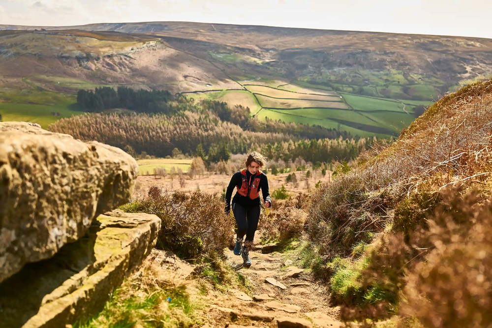 Rachel Hewitt running up a trail in the North York Moors