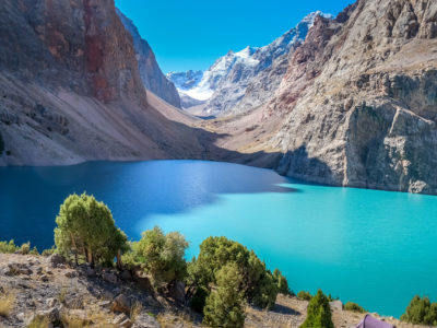 A bright emerald lake in the Fann Mountains of Tajikistan