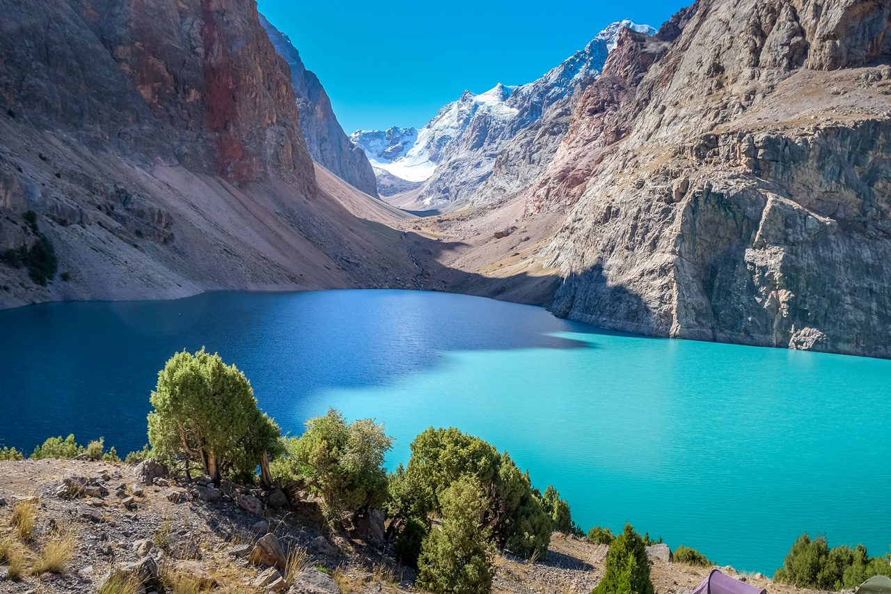 A bright emerald lake in the Fann Mountains of Tajikistan