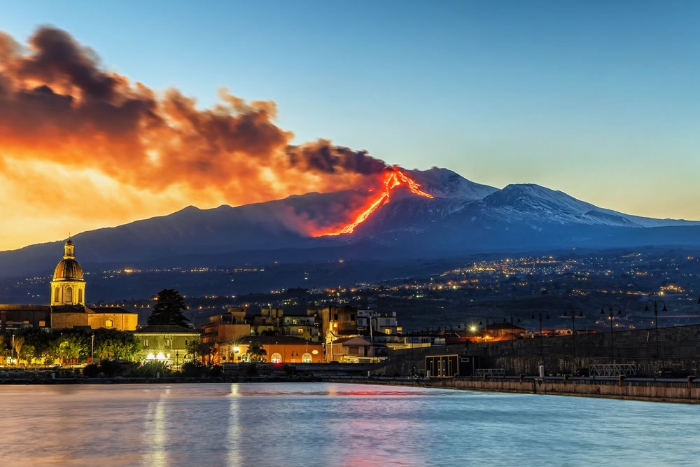 Mount Etna looms above the Ionian coast