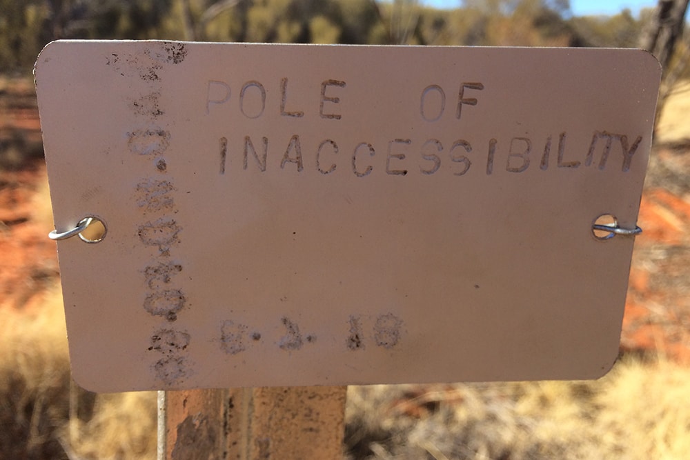 A decrepit sign marking the Australian pole