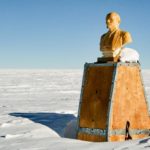 Lenin's bust surrounded by snow
